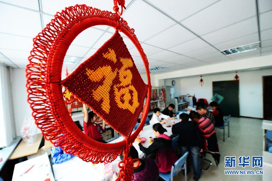 中国梦 我的梦：肢残教师编织“助残梦”