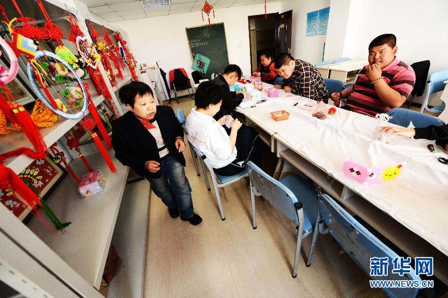 中国梦 我的梦:肢残教师编织"助残梦"