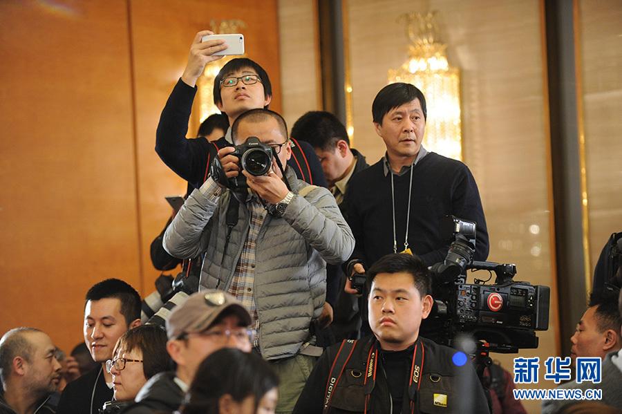 全国政协十二届四次会议新闻发布会 王国庆答记者问