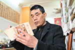 吴建国的州分藏书境界：万本小人书与人分享